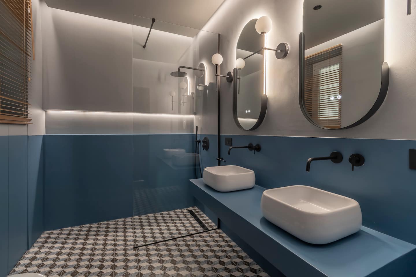 Blue bathroom with double vanity and shower – Domus Giulia